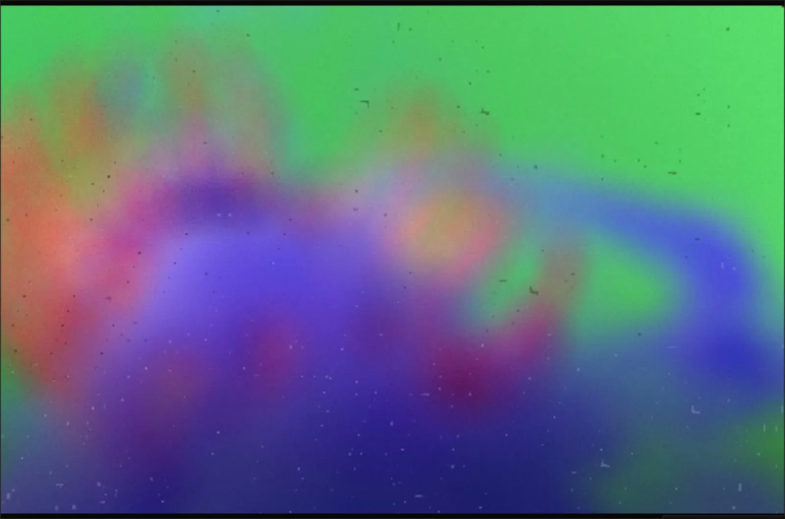 The untouched colour source frame: red-tipped ink tendrils and violet smoke on green.